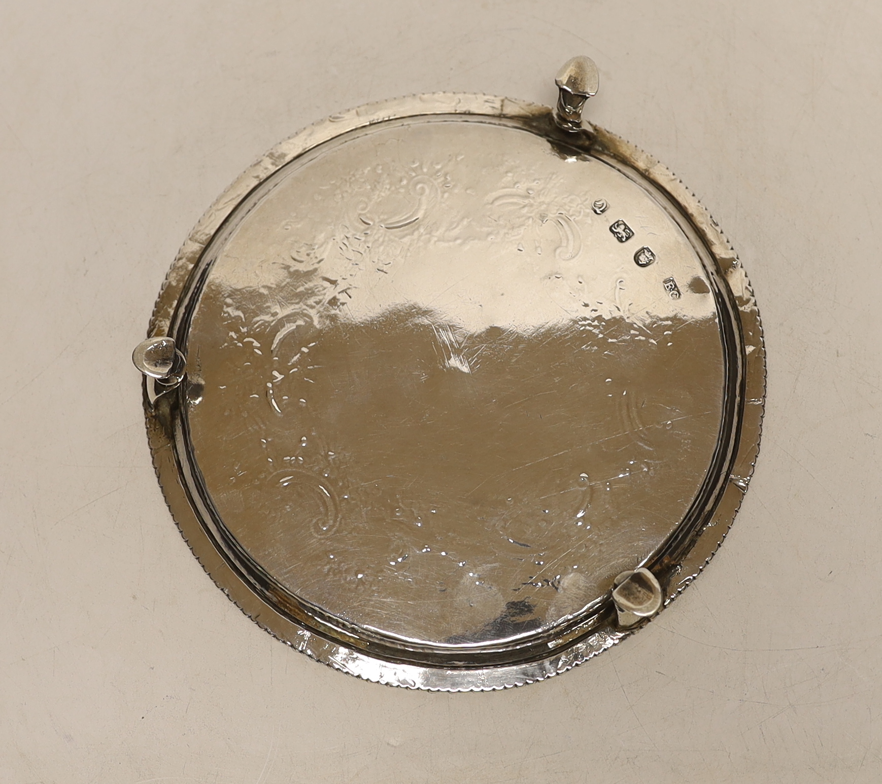 A George III silver waiter by Ebenezer Coker, London, 1771, with later engraved decoration, 15.2cm, 6.4oz.